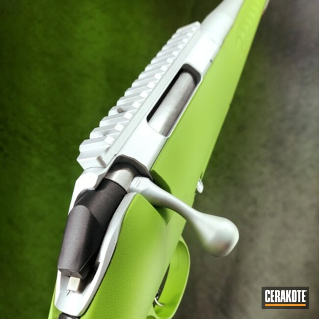 Bolt Action Rifle In Green And Silver