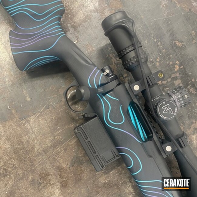 Remingtion Model 700 Coated With Cerakote In Graphite Black, Aztec Teal And Bright Purple