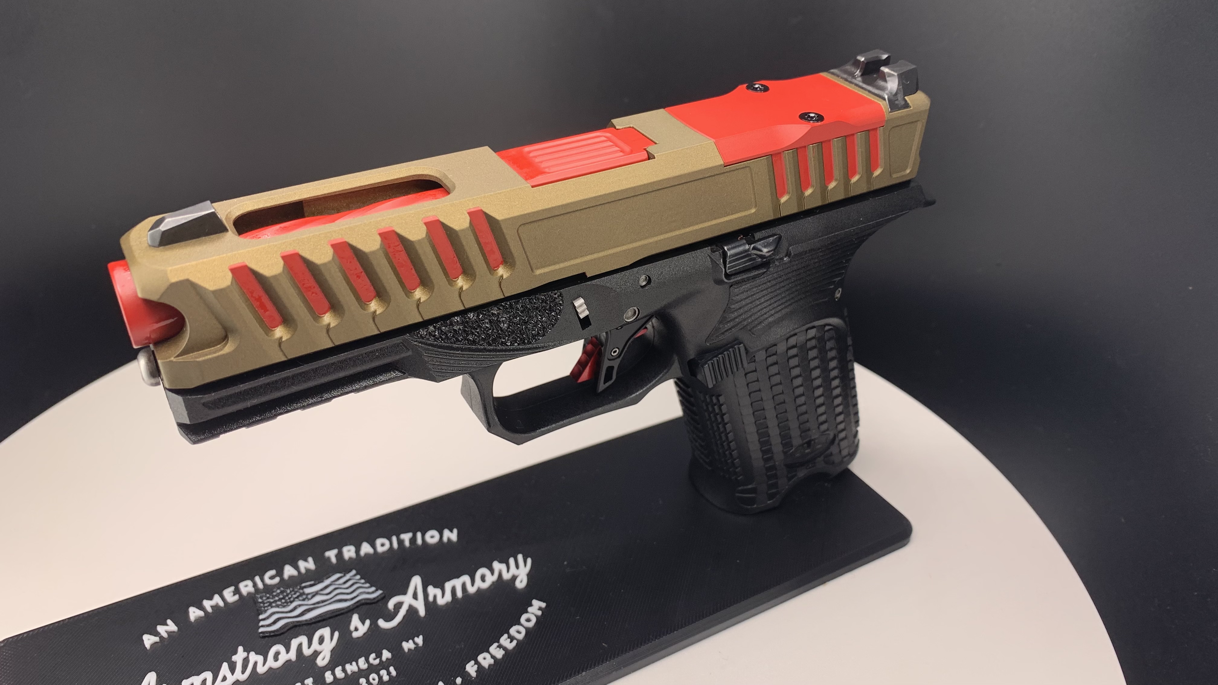 Burnt Bronze with Ruby Red Slide Serration Accents | Cerakote