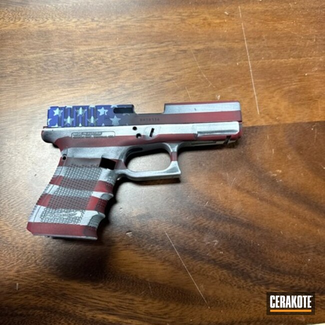 Glock 19 Distressed Flag Coated With Cerakote In Periwinkle, Stormtrooper White, Ruby Red And Midnight Blue