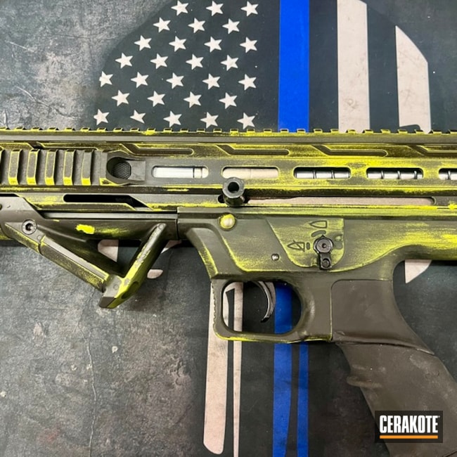 Battle Worn Black And Yellow 12 Gauge Bull Pup