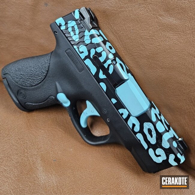 S&w Shield Coated With Cerakote In High Gloss Armor Clear, Graphite Black And Robin's Egg Blue