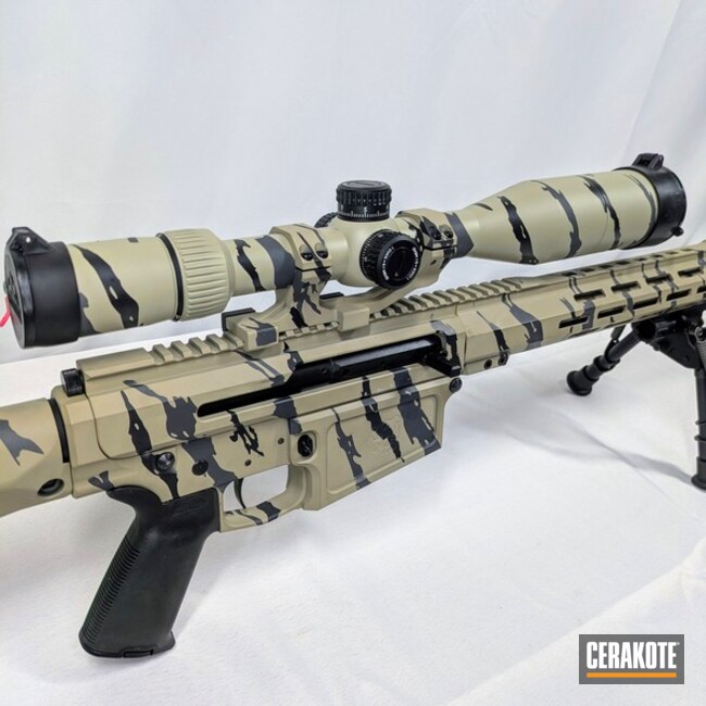 Rifle Coated In Desert Striped Camo