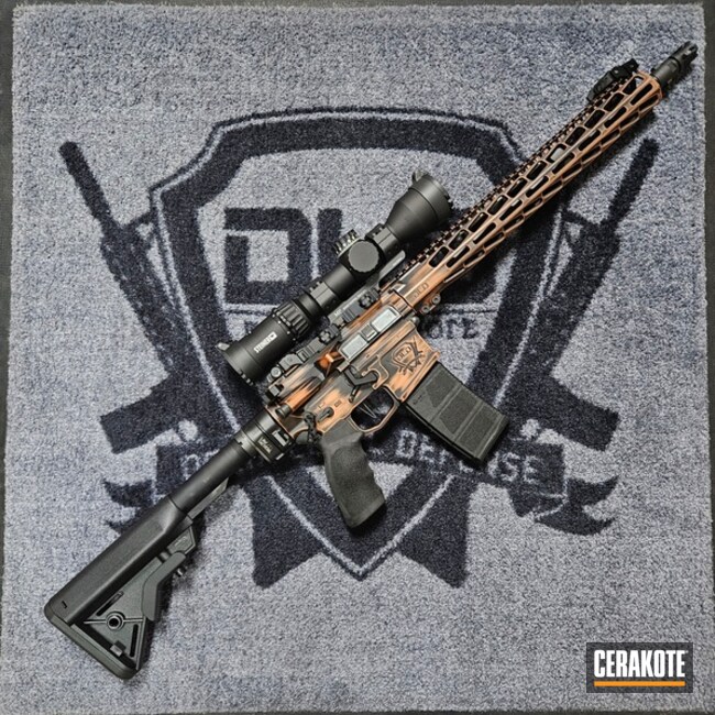 Copper And Black Distressed Ar-15 Rifle
