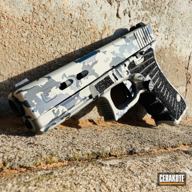 Glock 17 Coated With Cerakote In Kel-tec® Navy Blue, Desert Sand And Graphite Black