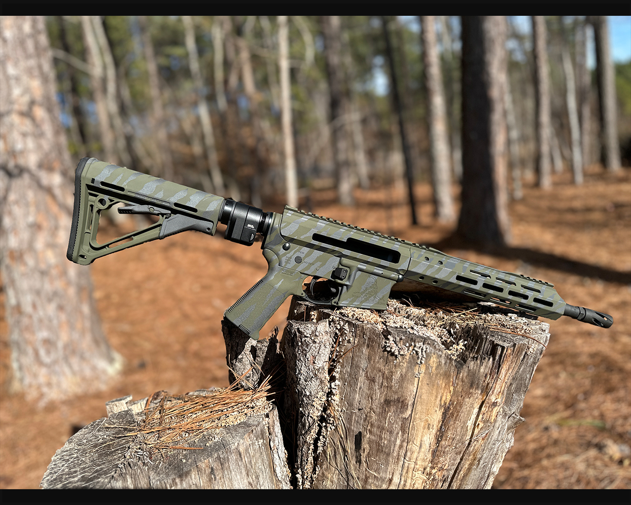 Ar-15 Folder finished in a Sniper Grey and Sniper Green Finish | Cerakote