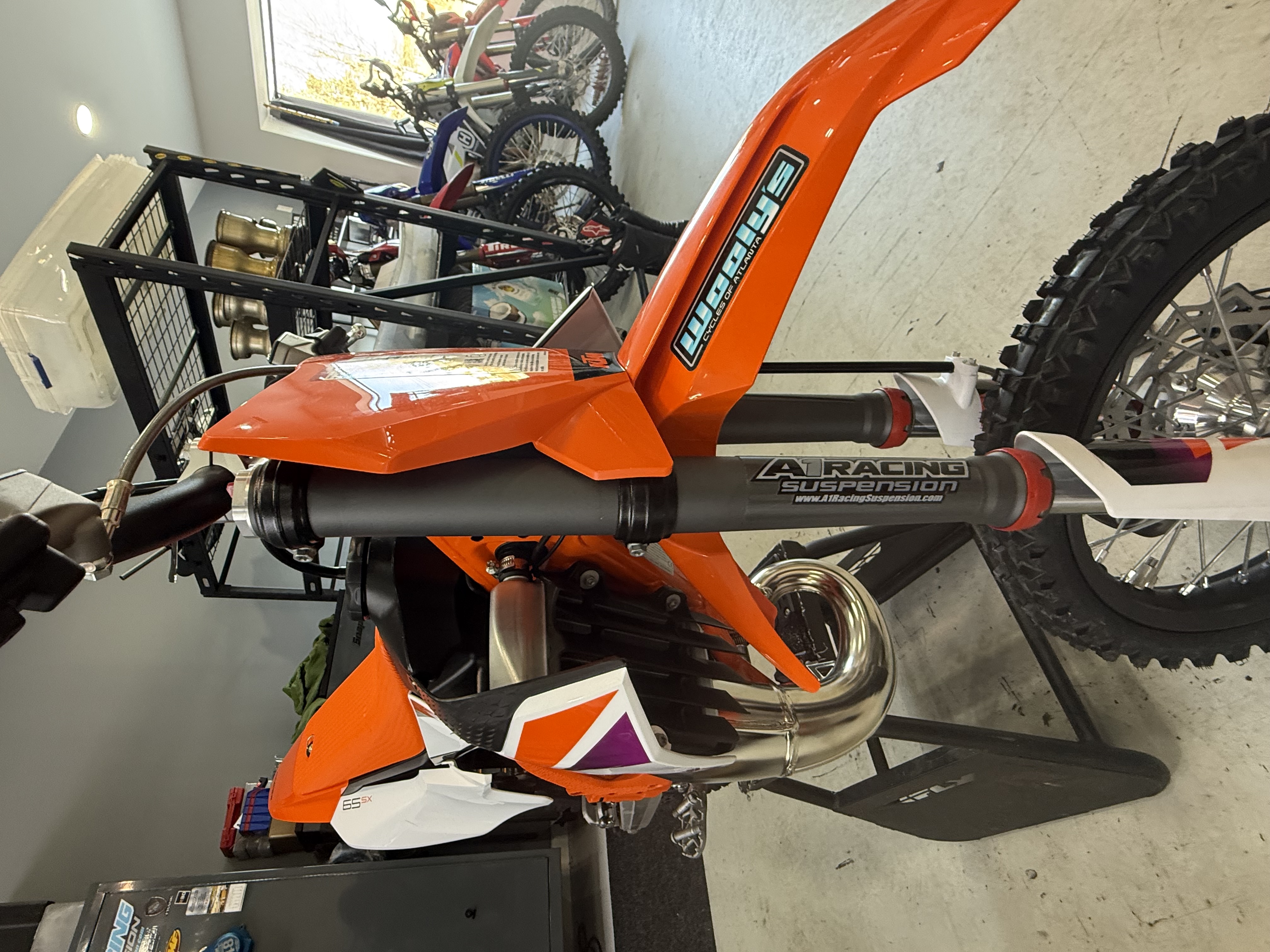 KTM 65 with carbon gray fork tubes and gloss, black triple clamps ...