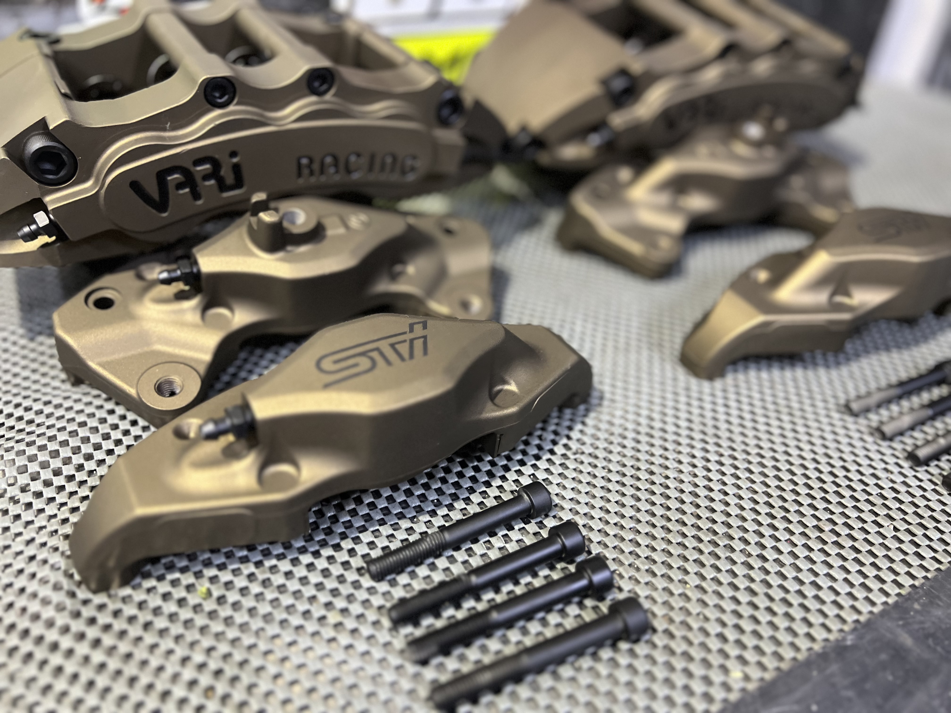 Subaru brake calipers - over sized front - graphite black lettering ...