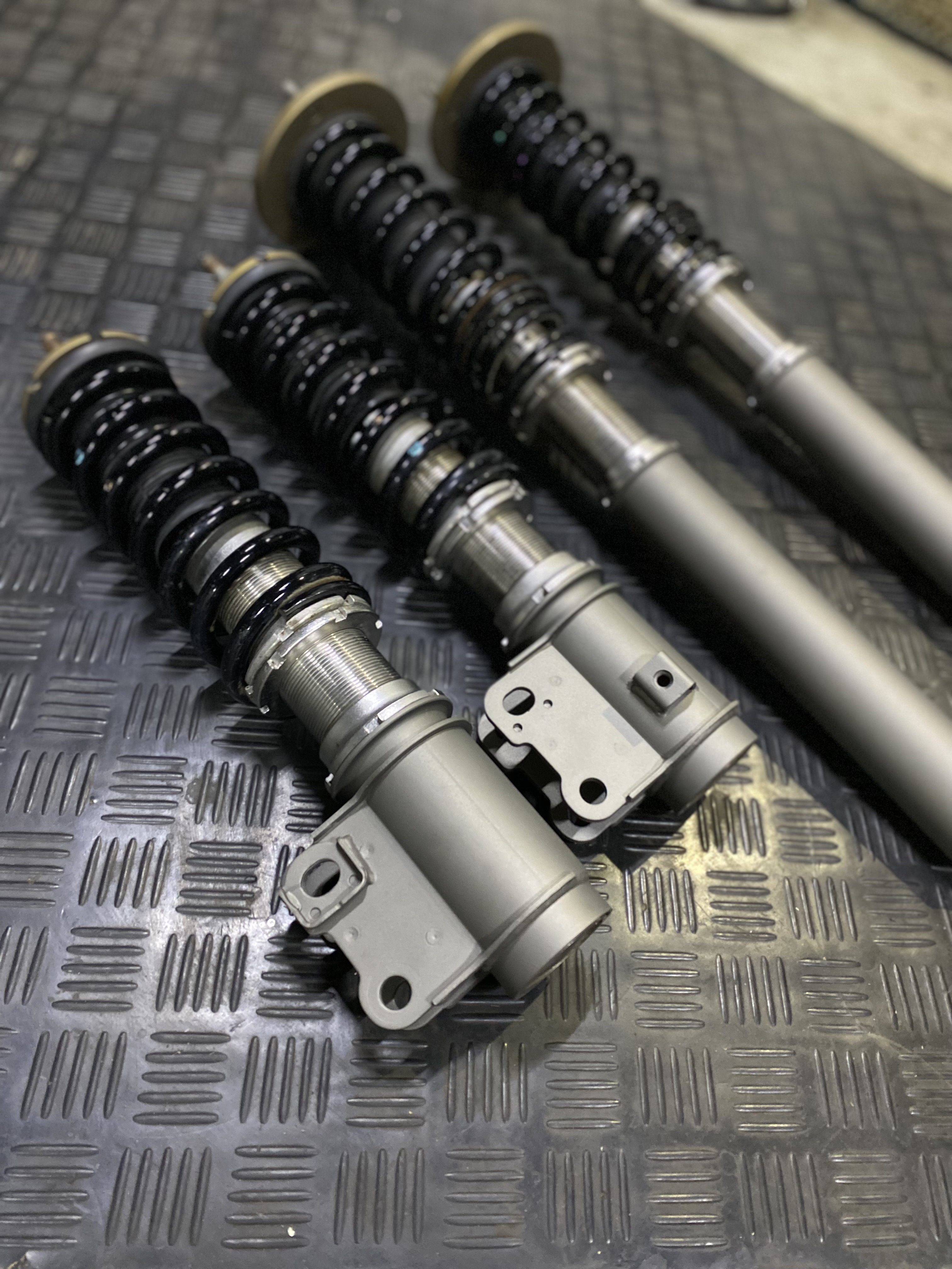 Race car shocks restored - Tungsten & burnt bronze | Cerakote
