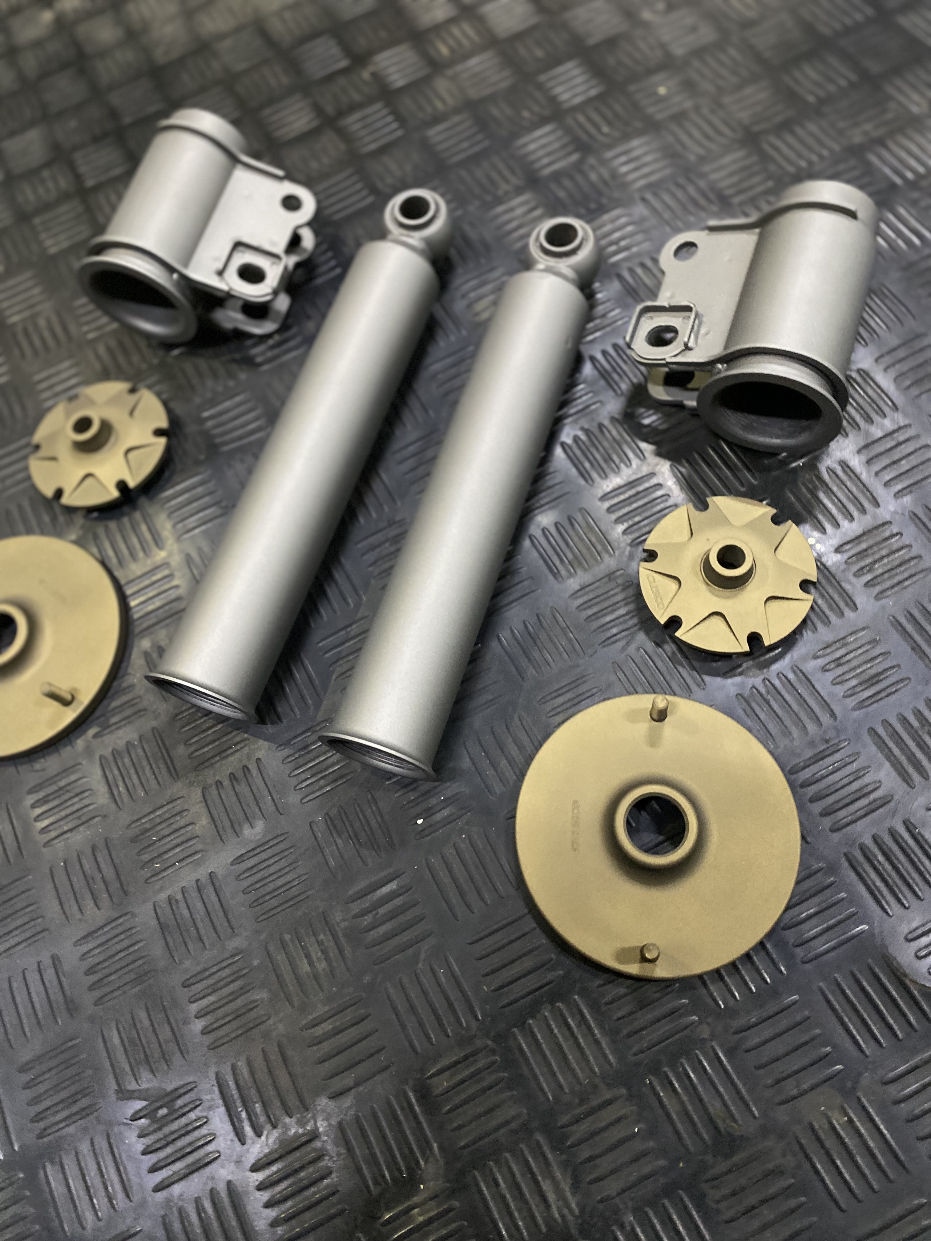 Race car shocks restored - Tungsten & burnt bronze | Cerakote