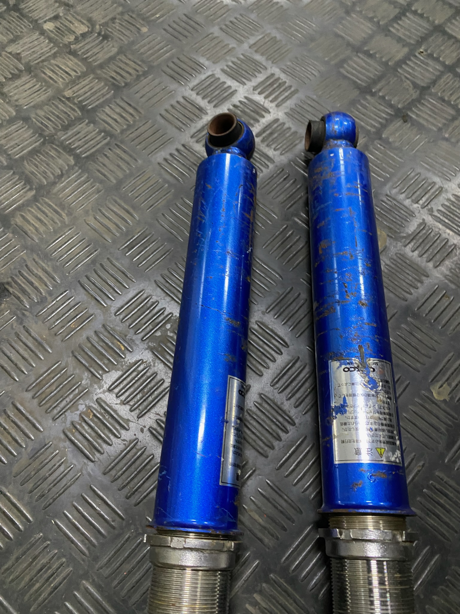 Race car shocks restored - Tungsten & burnt bronze | Cerakote