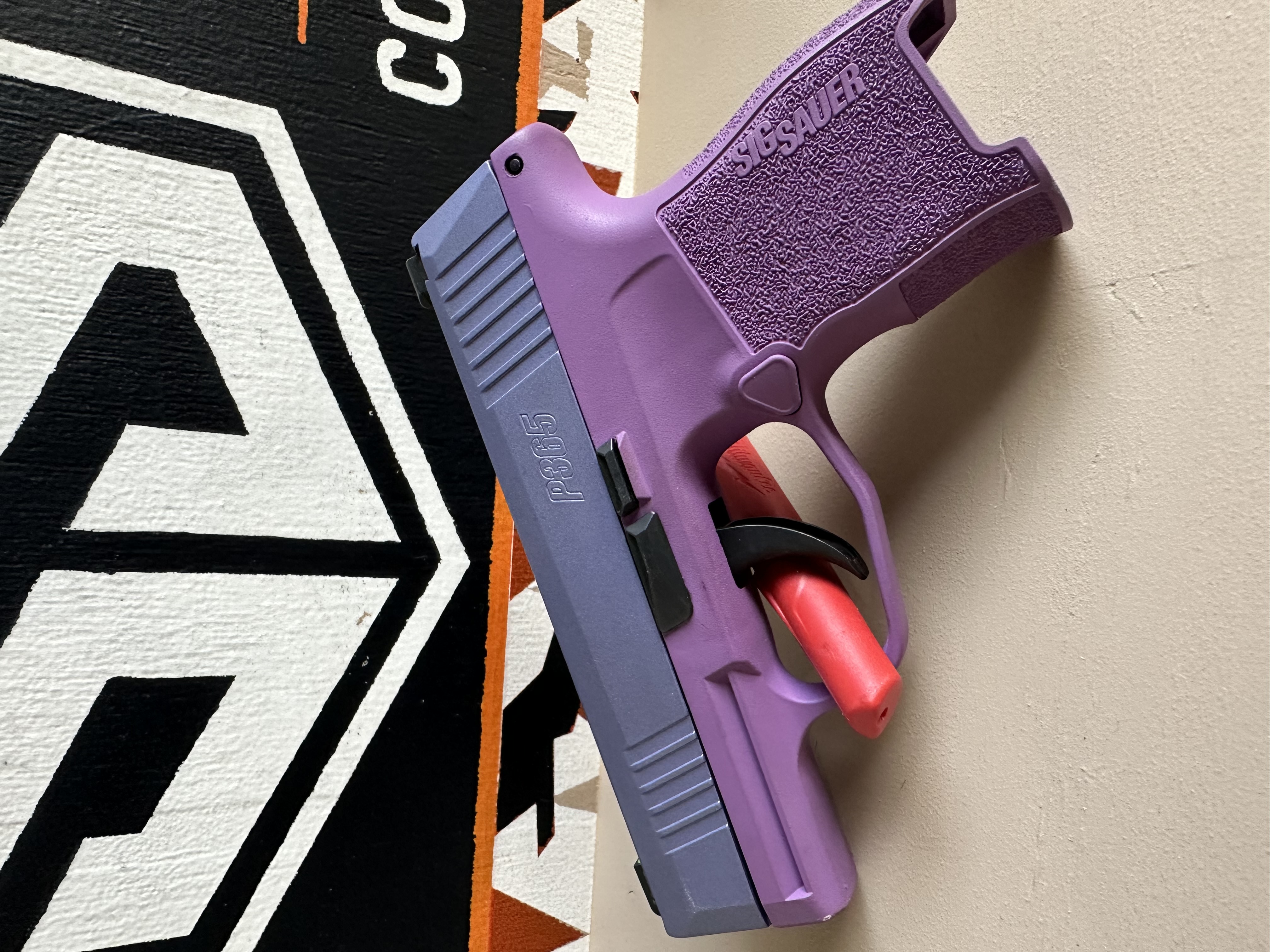 Purple P365 coated with Wild Purple, Sunflower and Bright Purple