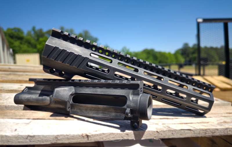 Upper and Handguard with a Graphite Black and Titanium Finish | Cerakote
