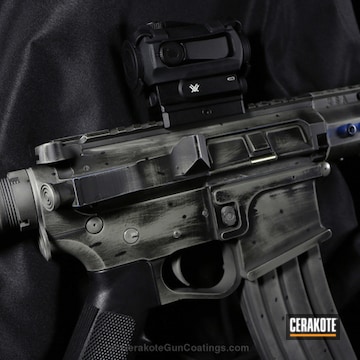 Cerakoted H-146 Graphite Black, H-171 Nra Blue, H-136 Snow White And H-214 Smith & Wesson Grey