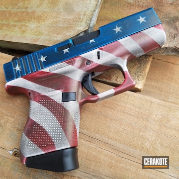 Cerakoted H-216 Smith & Wesson Red With H-136 Snow White And H-169 Sky Blue