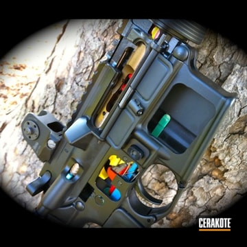Cerakoted H-190 Armor Black With H-171 Nra Blue, H-122 Gold And H-166 Electric Yellow