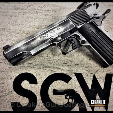 Cerakoted Distressed Springfield 1911 Done In H-297 Stormtrooper White And H-190 Armor Black