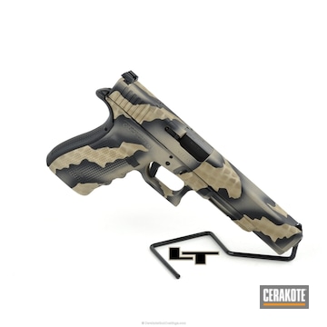Cerakoted Glock Handgun Finished In A Rip Torn Camo Pattern