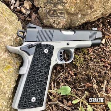 Cerakoted Colt Commander Handgun Coated In H-150 Savage Stainless And H-146 Graphite Black