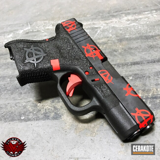 Cerakoted Glock Handgun Coated In H-146 Graphite Black, H-221 Crimson And H-210 Sig Dark Grey