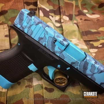 Cerakoted Custom Ladies Glock Finished With Graphite Black And Robin's Egg Blue