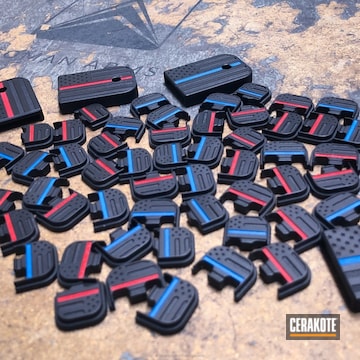 Cerakoted Glock Plates Coated In Cerakote's Usmc Red, Nra Blue And Armor Black