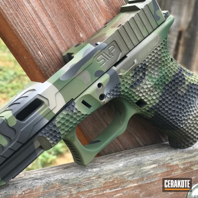 Cerakoted Glock Handgun In A Tropic Multicam Finish