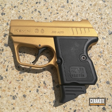 Cerakoted Handgun In H-146 Graphite Black, H-122 Gold And C-102 Graphite Black
