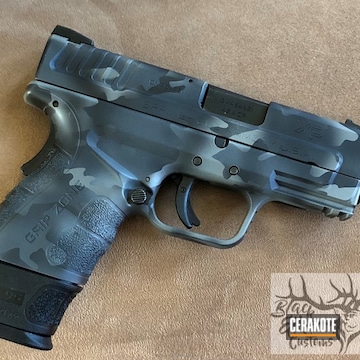 Cerakoted Springfield Xd Handgun Coated In A Black Multi Cam Finish