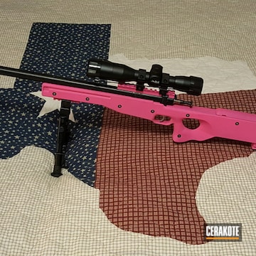 Cerakoted Cricket 22 Rifle Coated In H-141 Prison Pink