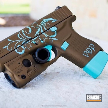 Cerakoted Personalized Glock 43 Handgun In H-175 Robin's Egg Blue And H-148 Burnt Bronze
