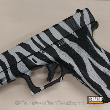 Cerakoted Cerakoted Glock Handgun In A Custom Zebra Stripe Finish
