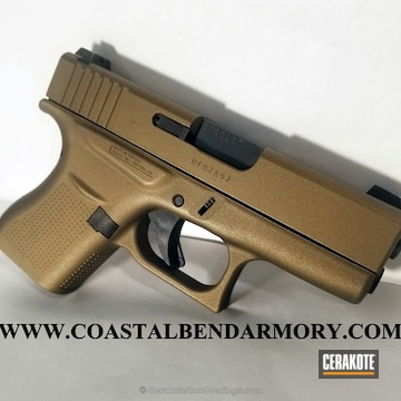 Cerakoted Glock 43 Handgun In A Solid Tone Burnt Bronze Finish