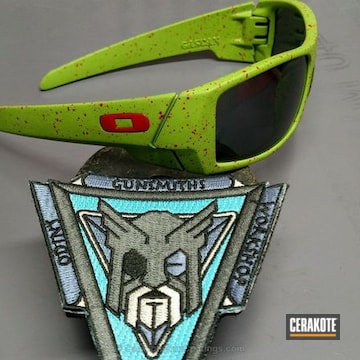 Cerakoted Oakley Sunglasses Coated In H-168 Zombie Green Ans H-216 Smith & Wesson Red