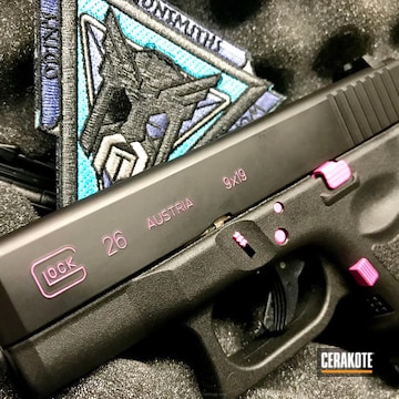 Cerakoted Glock 26 Handgun Done In A Graphite Black Finish With Prison Pink Accents