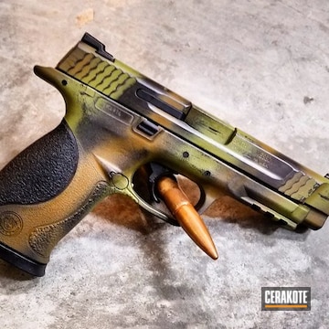 Cerakoted Smith & Wesson Handgun Done In A Distressed Rhodesian Camo Finish