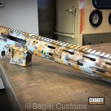 Cerakoted Battleship Grey Base With Mcmillan Tan And Vortex Bronze, Top Layer Coated With Desert Gold And Noveske Tiger Eye Brown