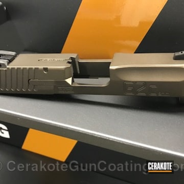 Cerakoted Taurus 9mm Handgun Coated In H-294 Midnight Bronze