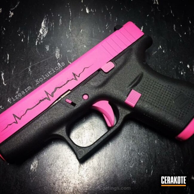 Cerakoted Glock 42 Handgun Done In H-141 Prison Pink And H-146 Graphite Black