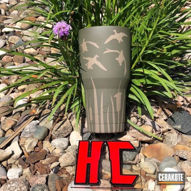 https://images.nicindustries.com/cerakote/projects/41454/high-caliber-firearms-duck-hunting-themed-ozark-trail-tumbler-86173-full.jpg?1579818805