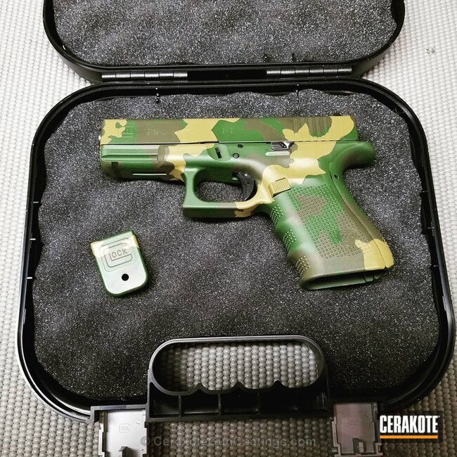 Cerakoted Glock Handgun In A Cerakote Jungle Multicam Finish