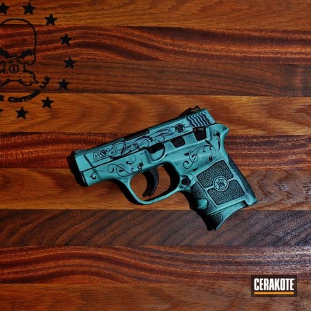 Powder Coating: Smith & Wesson M&P,Graphite Black H-146,Smith & Wesson,Distressed,Pistol,Robin's Egg Blue H-175