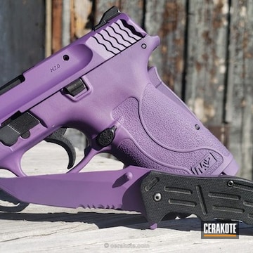 Cerakoted Smith & Wesson 9mm In A Bright Purple Finish