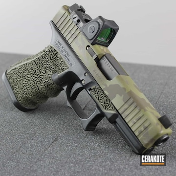 Cerakoted Glock 19 Handgun In A Cerakote Multicam Finish