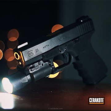 Cerakoted Glock 25 Handgun In A Cerakote Graphite Black Finish
