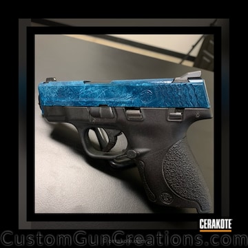 Cerakoted Smith & Wesson Handgun In A Cerakote Marbled Finish
