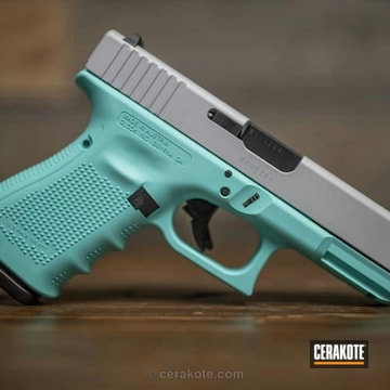 Cerakoted Two Toned Glock In Robin's Egg Blue And Crushed Silver