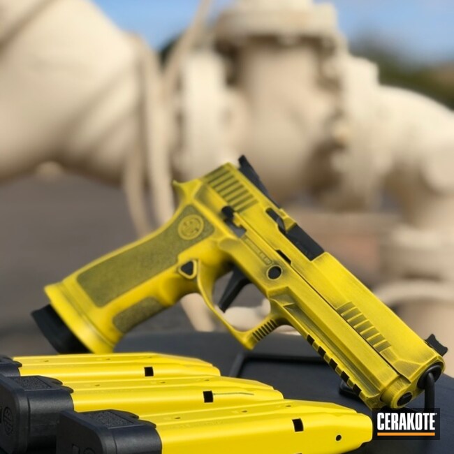 Cerakoted Distressed Yellow And Black Sig Sauer Handgun
