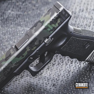 Cerakoted Glock 25 Handgun In A Cerakote Multicam Black Finish