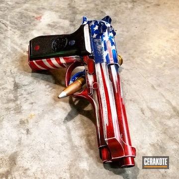 Cerakoted Beretta Handgun With A Cerakote Distressed Flag Finish